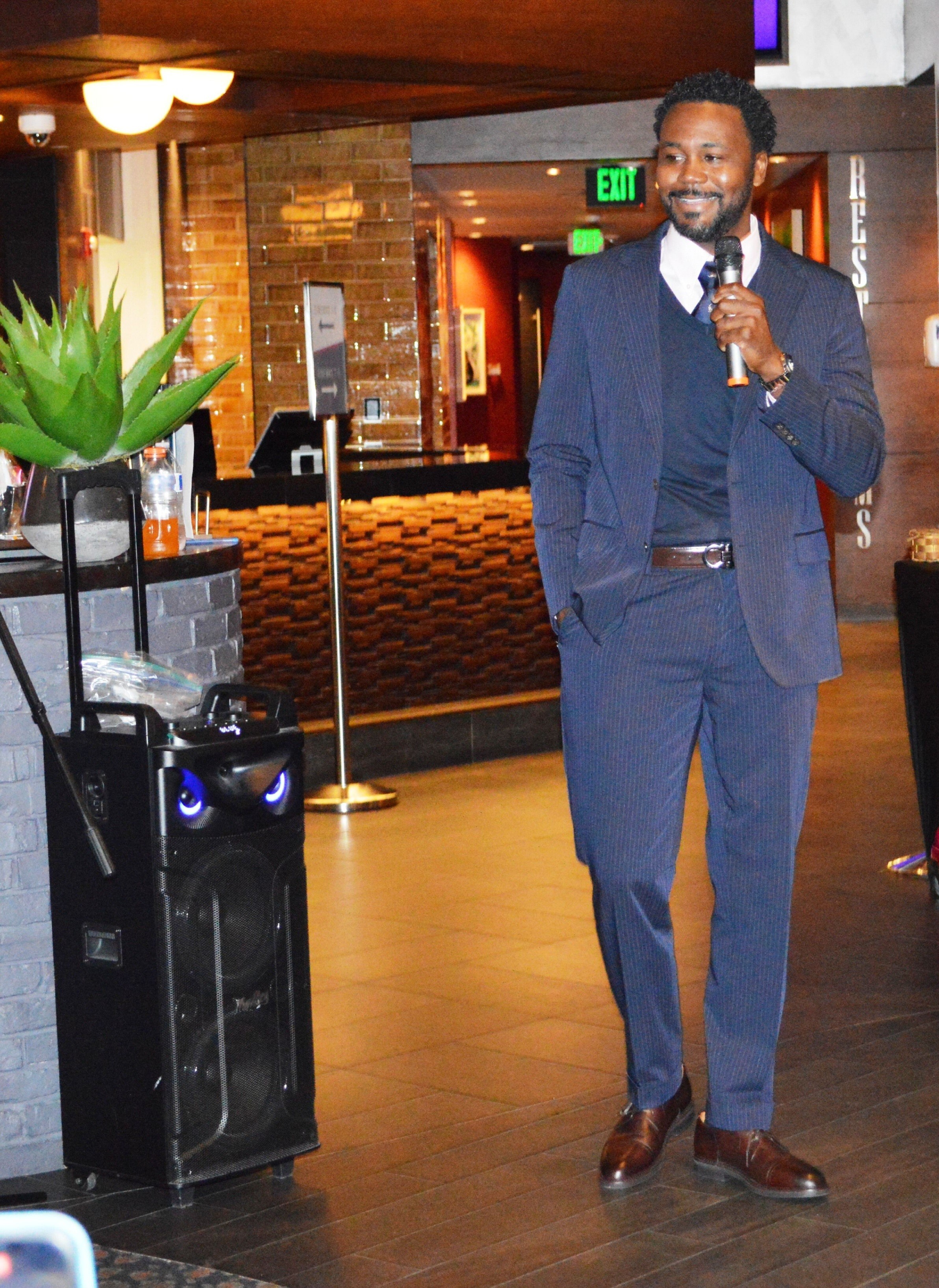 Dr. Stephen Wigley IV speaking at the Juneteenth luncheon